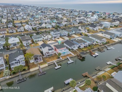 Welcome to 25 Newport Street, a breathtaking coastal retreat on Sea Trail Golf Resort in North Carolina - for sale on GolfHomes.com, golf home, golf lot