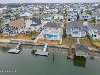 Welcome to 25 Newport Street, a breathtaking coastal retreat on Sea Trail Golf Resort in North Carolina - for sale on GolfHomes.com, golf home, golf lot