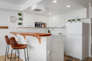 Beautifully furnished ground-floor corner unit located directly on Waikoloa Village Golf Club in Hawaii - for sale on GolfHomes.com, golf home, golf lot