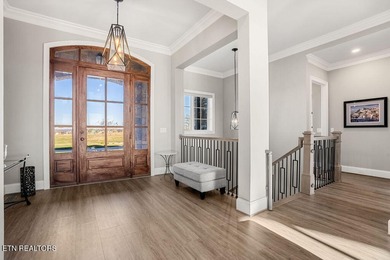 Luxury home for sale in Windriver with gorgeous views of Tellico on Wind River Golf Course in Tennessee - for sale on GolfHomes.com, golf home, golf lot