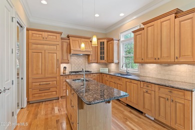 Pictures do not do this stunning home justice. Nestled in the on Members Club At St. James Plantation in North Carolina - for sale on GolfHomes.com, golf home, golf lot