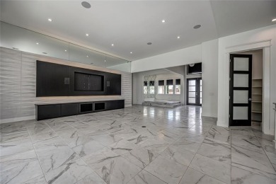 Breathtaking luxury residence nestled in one of Edmond's premier on Rose Creek Golf Club in Oklahoma - for sale on GolfHomes.com, golf home, golf lot