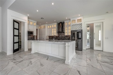 Breathtaking luxury residence nestled in one of Edmond's premier on Rose Creek Golf Club in Oklahoma - for sale on GolfHomes.com, golf home, golf lot