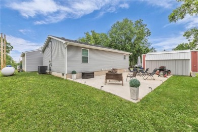 Welcome to your meticulously crafted retreat in the serene on Linn Valley Lakes - Deer Trace Golf Course in Kansas - for sale on GolfHomes.com, golf home, golf lot