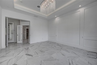 Breathtaking luxury residence nestled in one of Edmond's premier on Rose Creek Golf Club in Oklahoma - for sale on GolfHomes.com, golf home, golf lot