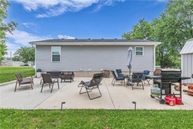 Welcome to your meticulously crafted retreat in the serene on Linn Valley Lakes - Deer Trace Golf Course in Kansas - for sale on GolfHomes.com, golf home, golf lot