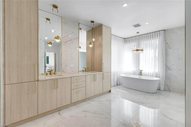 Welcome to 13087 Pond Apple Drive, a stunning, fully renovated on Quail Creek Country Club in Florida - for sale on GolfHomes.com, golf home, golf lot