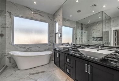 Breathtaking luxury residence nestled in one of Edmond's premier on Rose Creek Golf Club in Oklahoma - for sale on GolfHomes.com, golf home, golf lot