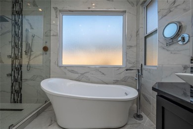 Breathtaking luxury residence nestled in one of Edmond's premier on Rose Creek Golf Club in Oklahoma - for sale on GolfHomes.com, golf home, golf lot