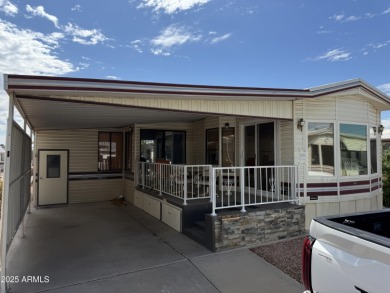 This property offers a great location in the Carriage Manor on Fountain of the Sun Country Club in Arizona - for sale on GolfHomes.com, golf home, golf lot