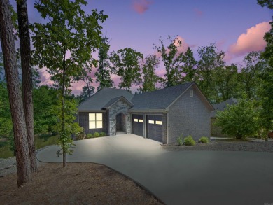 Live your best lake life in this stunning all-brick home on Lake on Isabella Golf Course  in Arkansas - for sale on GolfHomes.com, golf home, golf lot