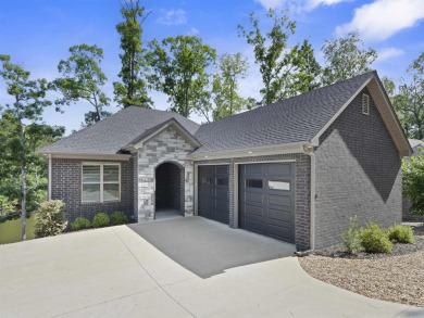 Live your best lake life in this stunning all-brick home on Lake on Isabella Golf Course  in Arkansas - for sale on GolfHomes.com, golf home, golf lot