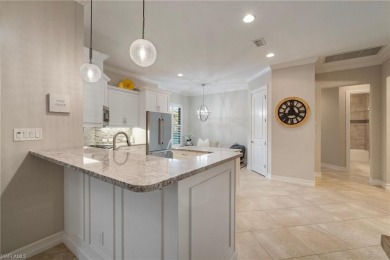 Enjoy the serenity of this spacious Capri Model Villa in the on The Classics Country Club At Lely Resort in Florida - for sale on GolfHomes.com, golf home, golf lot
