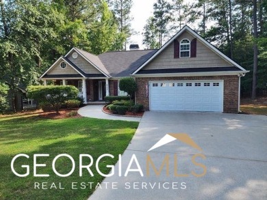 This one won't last long! Gorgeous 3/4 Bedroom 2 full bath on Fairfield Plantation Golf and Country Club in Georgia - for sale on GolfHomes.com, golf home, golf lot