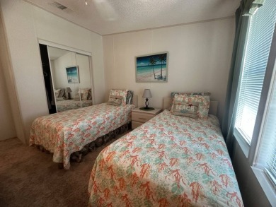This beautiful partially furnished home with a golf cart on Lake Fairways Country Club in Florida - for sale on GolfHomes.com, golf home, golf lot