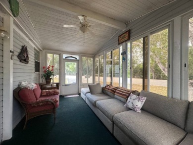 This beautiful partially furnished home with a golf cart on Lake Fairways Country Club in Florida - for sale on GolfHomes.com, golf home, golf lot