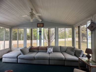 This beautiful partially furnished home with a golf cart on Lake Fairways Country Club in Florida - for sale on GolfHomes.com, golf home, golf lot