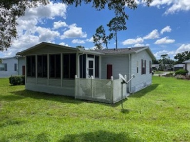This beautiful partially furnished home with a golf cart on Lake Fairways Country Club in Florida - for sale on GolfHomes.com, golf home, golf lot