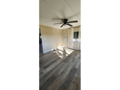 Manufactured Home on Leased Land with Lot Rent. This beautifully on Fairways Country Club in Florida - for sale on GolfHomes.com, golf home, golf lot