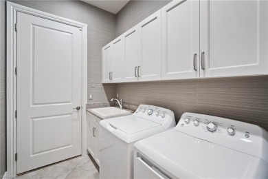 Enjoy the serenity of this spacious Capri Model Villa in the on The Classics Country Club At Lely Resort in Florida - for sale on GolfHomes.com, golf home, golf lot