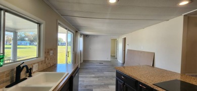 Manufactured Home on Leased Land with Lot Rent. This beautifully on Fairways Country Club in Florida - for sale on GolfHomes.com, golf home, golf lot