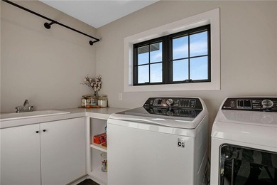 Here is your opportunity to own a stunning, nearly new modern on Blackberry Ridge Golf Club in Minnesota - for sale on GolfHomes.com, golf home, golf lot