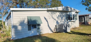 Manufactured Home on Leased Land with Lot Rent. This beautifully on Fairways Country Club in Florida - for sale on GolfHomes.com, golf home, golf lot