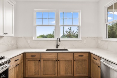 Discover unparalleled luxury in this brand-new, custom-built on The Bridgewater Club  in Indiana - for sale on GolfHomes.com, golf home, golf lot