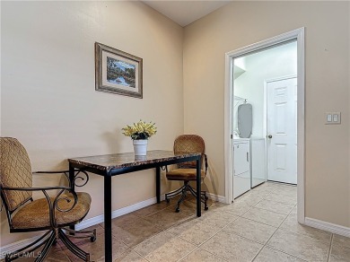 Welcome to this charming Solana home in the friendly HERONS GLEN on Herons Glen Golf and Country Club in Florida - for sale on GolfHomes.com, golf home, golf lot