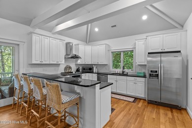 Tucked within the maritime forest and overlooking the 15th on Bald Head Island Golf Club in North Carolina - for sale on GolfHomes.com, golf home, golf lot