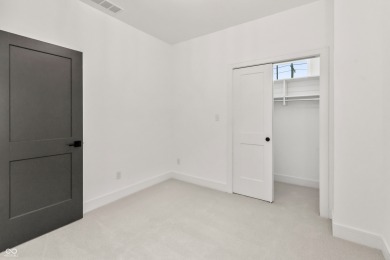 Discover unparalleled luxury in this brand-new, custom-built on The Bridgewater Club  in Indiana - for sale on GolfHomes.com, golf home, golf lot