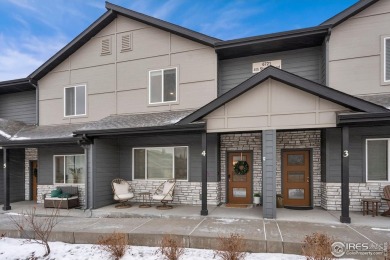 Welcome to this upscale contemporary townhome! Upon entering on Boomerang Links in Colorado - for sale on GolfHomes.com, golf home, golf lot