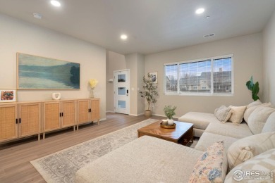 Welcome to this upscale contemporary townhome! Upon entering on Boomerang Links in Colorado - for sale on GolfHomes.com, golf home, golf lot