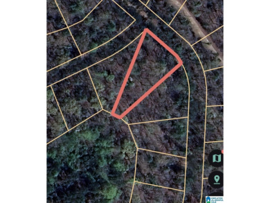 1.21-acre treed lot in the Point Aquarius subdivision of Alpine on Alpine Bay Resort in Alabama - for sale on GolfHomes.com, golf home, golf lot