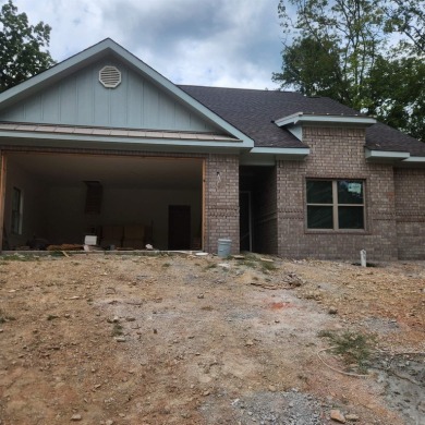 Introducing this impressive newly constructed residence on Diamondhead Golf and Country Club in Arkansas - for sale on GolfHomes.com, golf home, golf lot