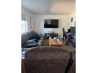 Spacious & Well-Maintained Duplex Near the Golf Course! This on Ruby View Golf Course in Nevada - for sale on GolfHomes.com, golf home, golf lot