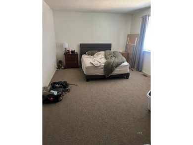 Spacious & Well-Maintained Duplex Near the Golf Course! This on Ruby View Golf Course in Nevada - for sale on GolfHomes.com, golf home, golf lot