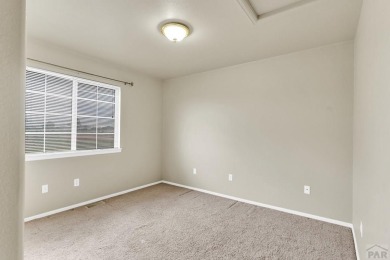 This 3-bedroom, 3-bathroom stucco home in Pueblo West offers on Desert Hawk At Pueblo West in Colorado - for sale on GolfHomes.com, golf home, golf lot