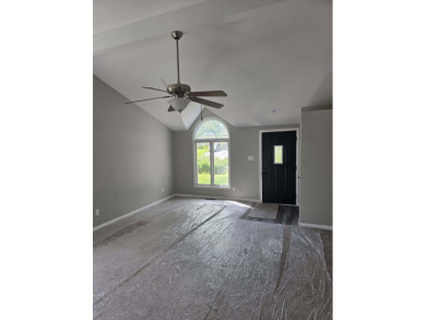 Welcome to this beautifully updated 3-bedroom, 3-bathroom home on Lake of Four Seasons Country Club in Indiana - for sale on GolfHomes.com, golf home, golf lot