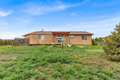 This 3-bedroom, 3-bathroom stucco home in Pueblo West offers on Desert Hawk At Pueblo West in Colorado - for sale on GolfHomes.com, golf home, golf lot
