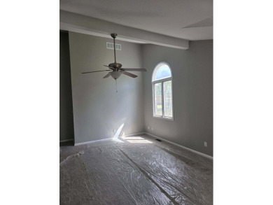 Welcome to this beautifully updated 3-bedroom, 3-bathroom home on Lake of Four Seasons Country Club in Indiana - for sale on GolfHomes.com, golf home, golf lot