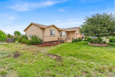 This 3-bedroom, 3-bathroom stucco home in Pueblo West offers on Desert Hawk At Pueblo West in Colorado - for sale on GolfHomes.com, golf home, golf lot