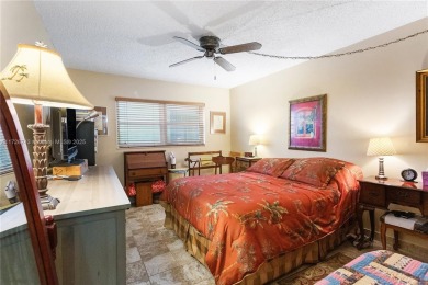 This well maintained 2-bedroom, 2-bathroom condo is located in a on Eco Golf Club in Florida - for sale on GolfHomes.com, golf home, golf lot