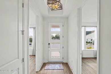 Like new, crisp, modern Villa with designer finishes throughout on Palm Valley Golf Club in Florida - for sale on GolfHomes.com, golf home, golf lot