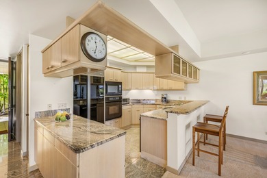 Mauna Lani Point B102 is a desirable ground-floor one-bedroom on Mauna Lani Resort Golf Course in Hawaii - for sale on GolfHomes.com, golf home, golf lot