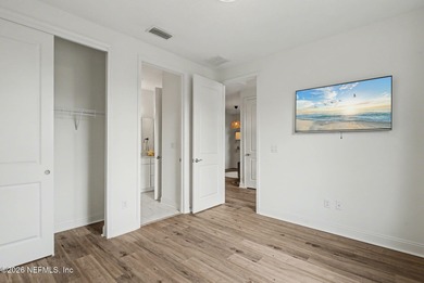 Like new, crisp, modern Villa with designer finishes throughout on Palm Valley Golf Club in Florida - for sale on GolfHomes.com, golf home, golf lot