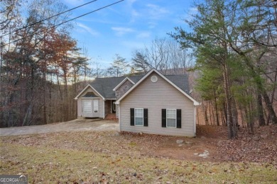 Welcome home to your own private mountainside retreat in Lake on The Highlands Course at Lake Arrowhead in Georgia - for sale on GolfHomes.com, golf home, golf lot