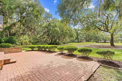 Welcome to 423 Chapman Loop, a lovely traditional home located on Willbrook Plantation Golf Club in South Carolina - for sale on GolfHomes.com, golf home, golf lot