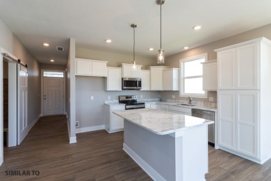Introducing Jerry's Homes' New *Wayne* Plan in Spring Meadows - on Sugar Creek Golf Course in Iowa - for sale on GolfHomes.com, golf home, golf lot