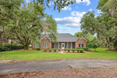Welcome to 423 Chapman Loop, a lovely traditional home located on Willbrook Plantation Golf Club in South Carolina - for sale on GolfHomes.com, golf home, golf lot